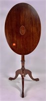 Oval tip top table, mahogany, sunburst and