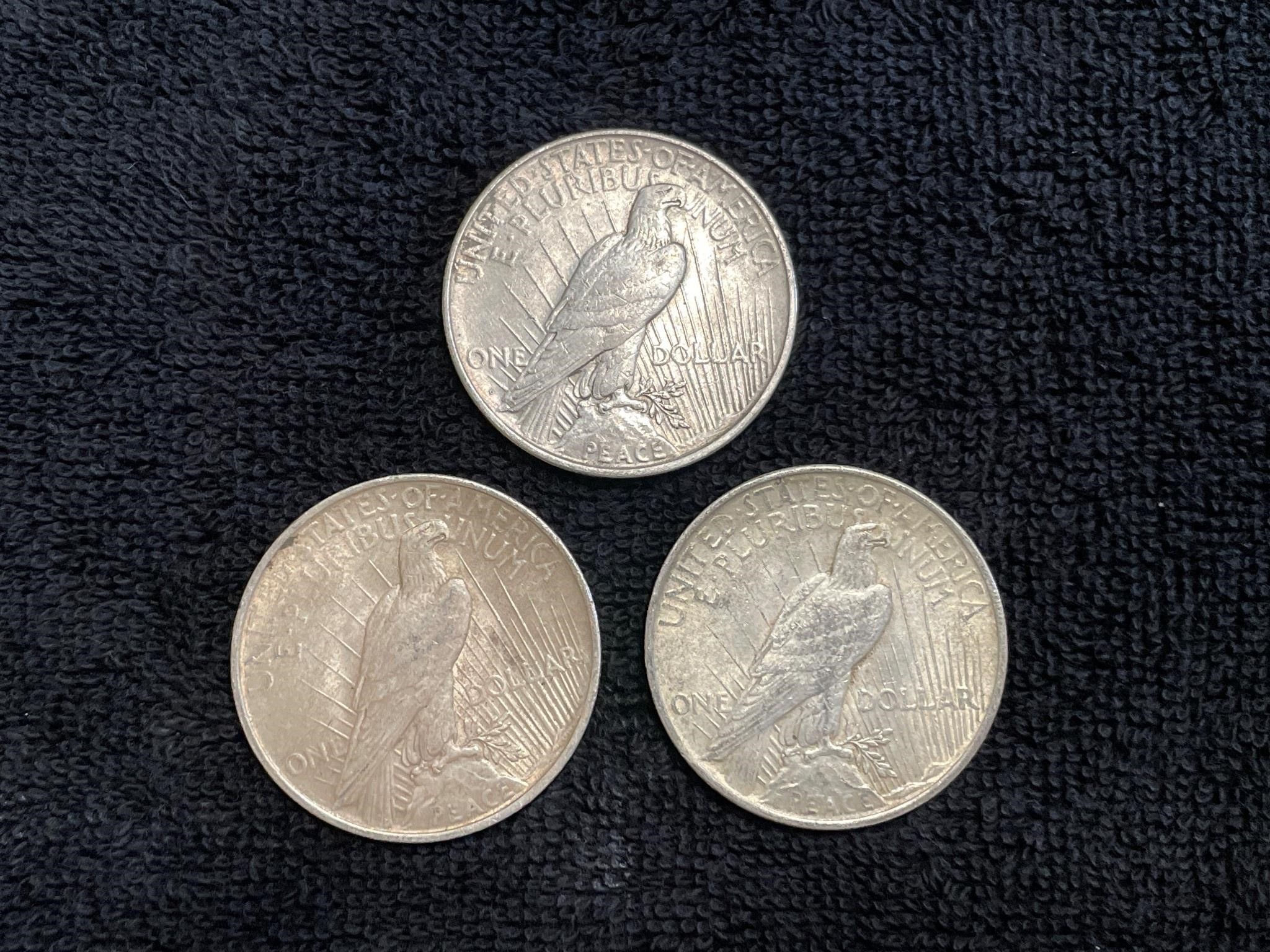 3 - 1922 silver dollars