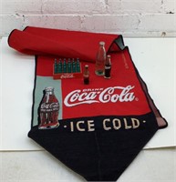 Miniature Coca-Cola bottles and banner