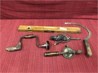 5 hand tools: level, 2 hand drills, sickle, and a