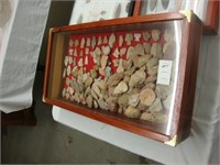 Large case containing many arrowheads.