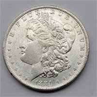 1884 O MORGAN SILVER DOLLAR BU