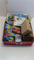 building blocks, safety scissors, baseball cards