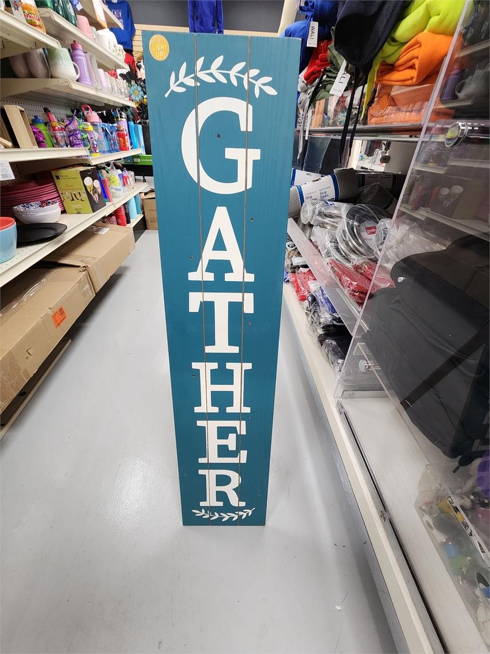 GATHER lit sign