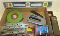 Level, measure tape, stapler and staples,