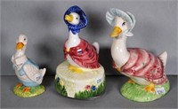 Three Beatrix Potter duck figures