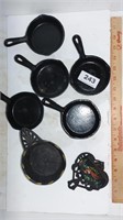 5 cast iron ash trays, match stick holder