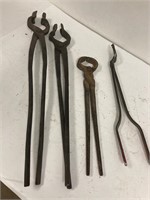 Black smith tongs and hoof trimmers.