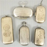 5 small sterling silver token / coin purses, etc.