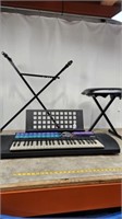 Yahama PSR-77 keyboard with stand and seat.