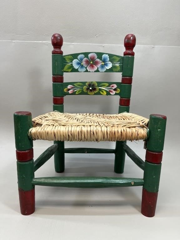 floral wooden kids chair with thatch seat.