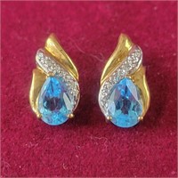 Blue Topaz Earrings with Diamond Accents set in