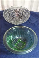 Pair of large bowls green one is cracked