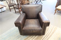 Brown antiqued leather club chair