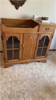 WOOD CABINET WITH GLASS FRONT DOORS AND DRAWER