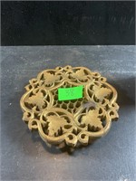 Carved teak trivet with feet