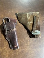 TWO LEATHER GUN HOLSTERS