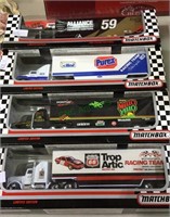 Model trucks, four model 18 wheel trucks,