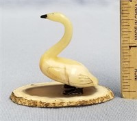 2" fossilized ivory carving of a swan, mounted on