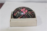 A Hand Painted Wooden Egg