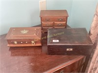Group of three small wooden boxes