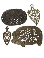 Lot of 4 Cast Iron Trivets or Wall Hangings