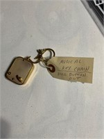 Antique functioning Swiss made music box key chain