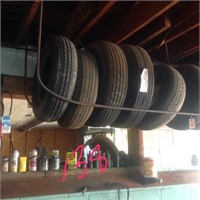 11 tires and shelf contents