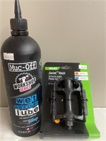 1L bottle of Muc-Off Wet Leather Lube and a spare