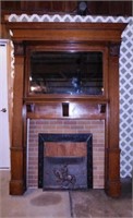Carved oak fireplace mantle w/ beveled mirror,
