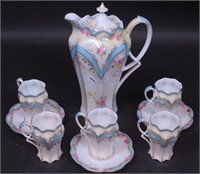 An unmarked porcelain hot chocolate set including