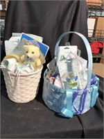 Two baskets full of new baby items - great baby