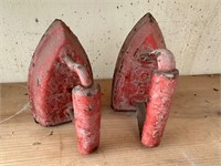 Two Red Cast Sad Irons