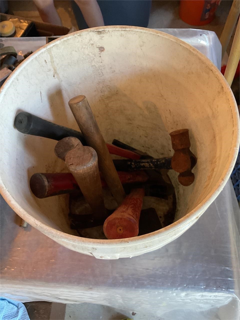 Bucket lot full of hammers and mallets