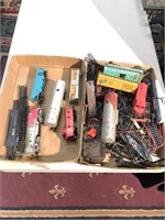 Two boxes of HO train engines cars, track,