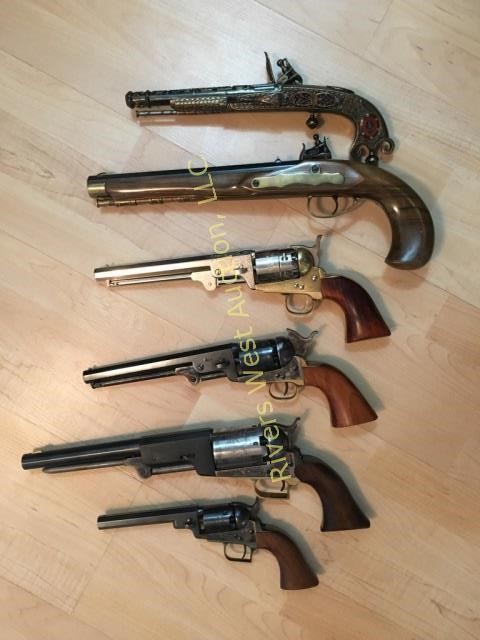 assortment of blackpowder pistols. 1960's A Uberti Colt replicas and others