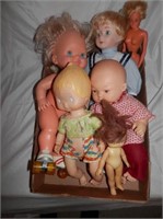 Group of vintage dolls, one wind up Roller Derby