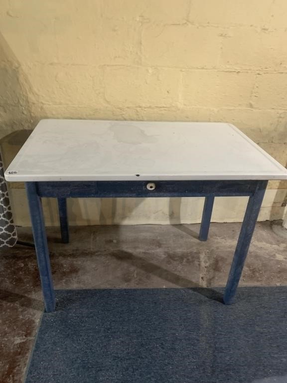 PORCELAIN TOP TABLE W/ CENTER DRAWER AND TWO