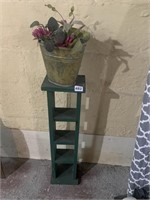 GREEN STAND, FLOWERS IN BUCKET