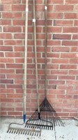 3 garden rakes with wood handles