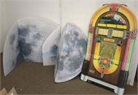 Cardboard jukebox and moons