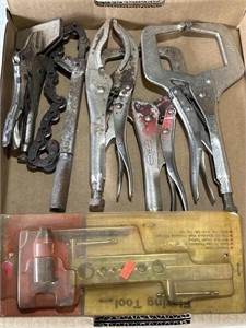 Assorted pliers. Assorted locking clamps.