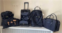 Lot of Black Luggage including Duffel Bags