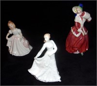 Modern Royal Doulton figurines.