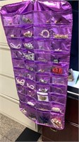 Great hanging jewelry bag filled with costume