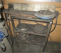 (5) Bridgeport bed tool holders on metal stand.