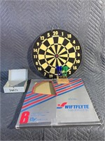 Dartboard comes with darts.5a