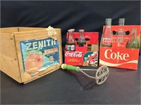BC wooden fruit box with Coke bottles, some full