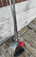 Grouping of broom, mops and air pump