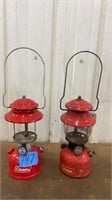 Two Coleman lanterns one with glass one without